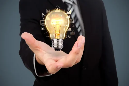 businessman-with-light-bulb-in-his-hand (1)